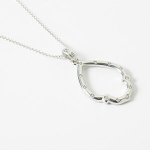 Vintage Avon (produced by SAQ Manufacturing) silver finish necklace/cz & pendant